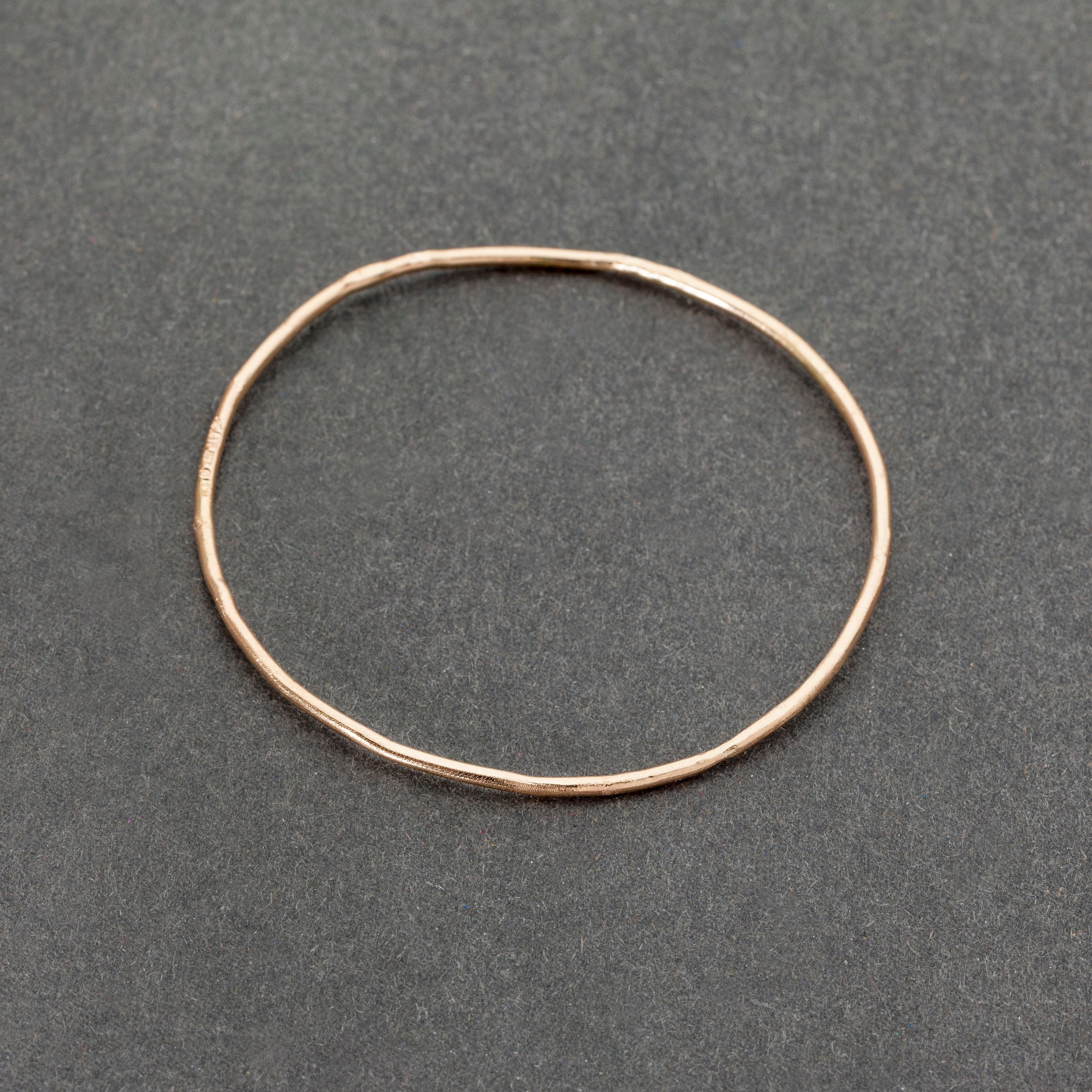 Bris- armring i 18k guld
