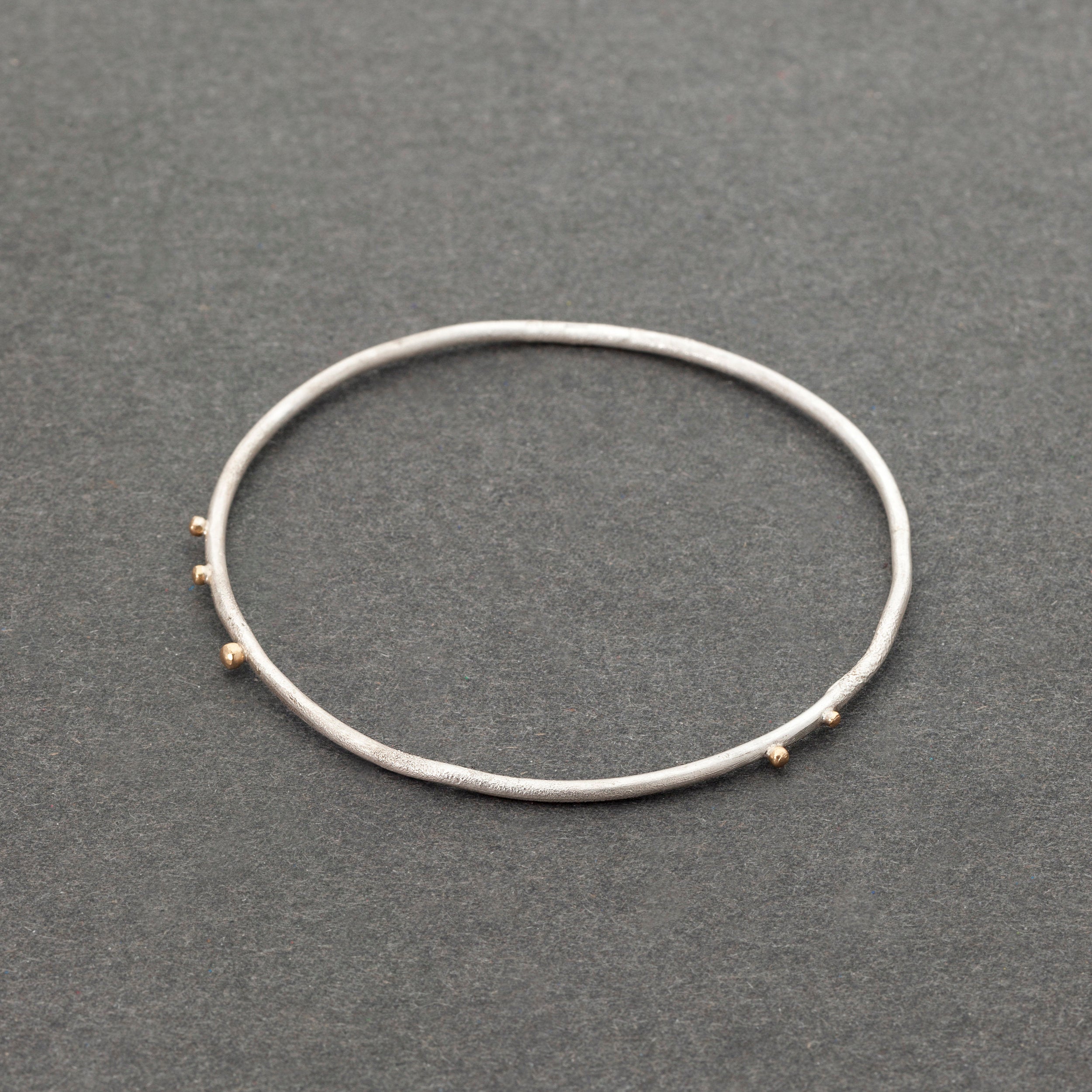 Solsken- armring i äkta silver